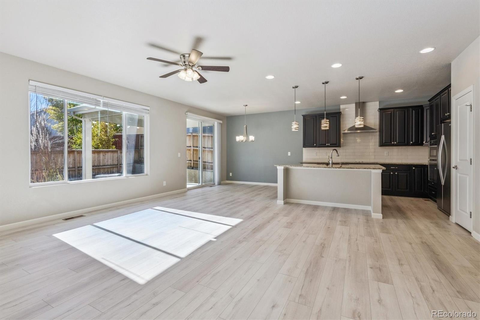 767 Wagon Bend Road Berthoud, CO 80513 - Photo 4 of 21 a view of kitchen with cabinets and wooden floor