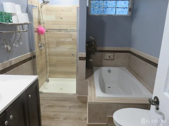 a bathroom with a sink and toilet