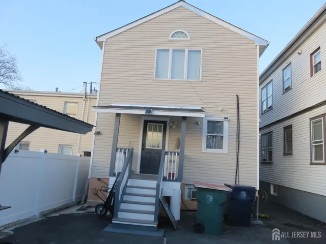 a view of a house with more windows and stairs