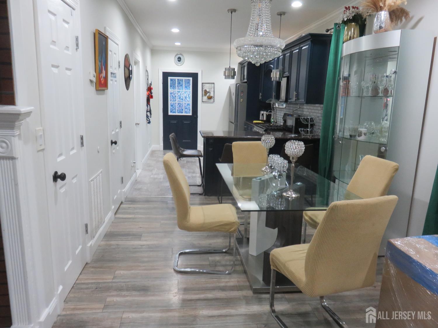 473 Hall Avenue Perth Amboy, NJ 08861 - Photo 7 of 21 a view of a dining room with furniture