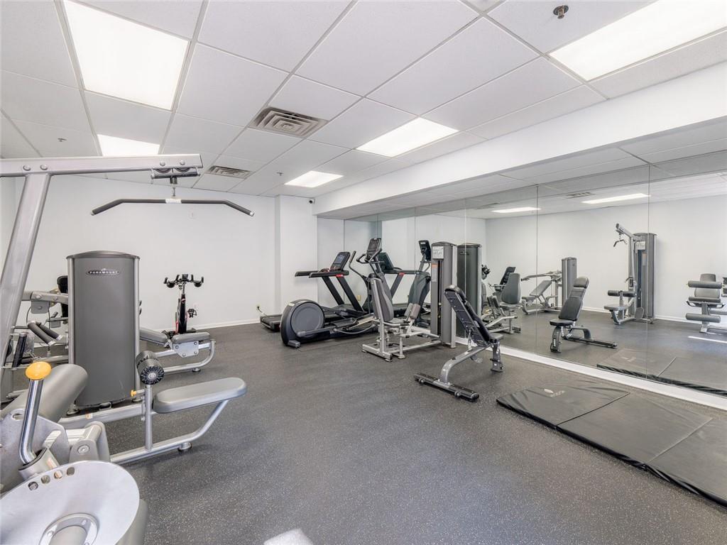 275 13th Street Northeast, Unit 1106 Atlanta, GA 30309 - Photo 17 of 22 a view of a room with gym equipment