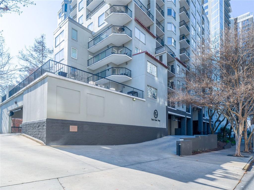275 13th Street Northeast, Unit 1106 Atlanta, GA 30309 - Photo 2 of 22 a view of a building with many windows
