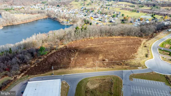 a view of a lake from a balcony