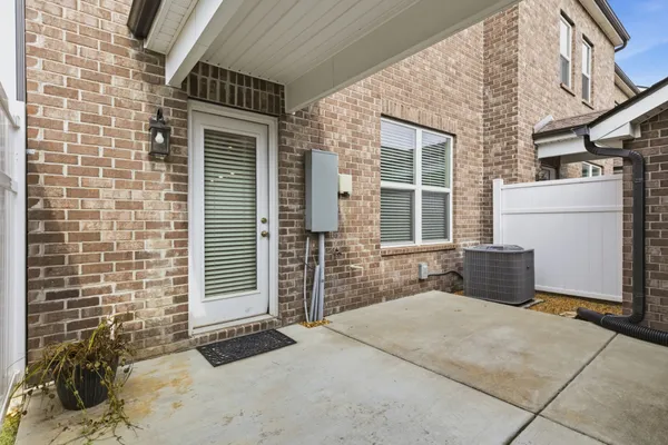 a backyard of a house with seating space