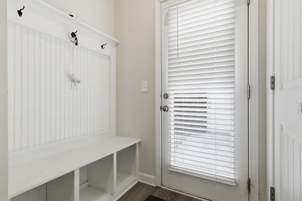 a bathroom with a shower and a sink