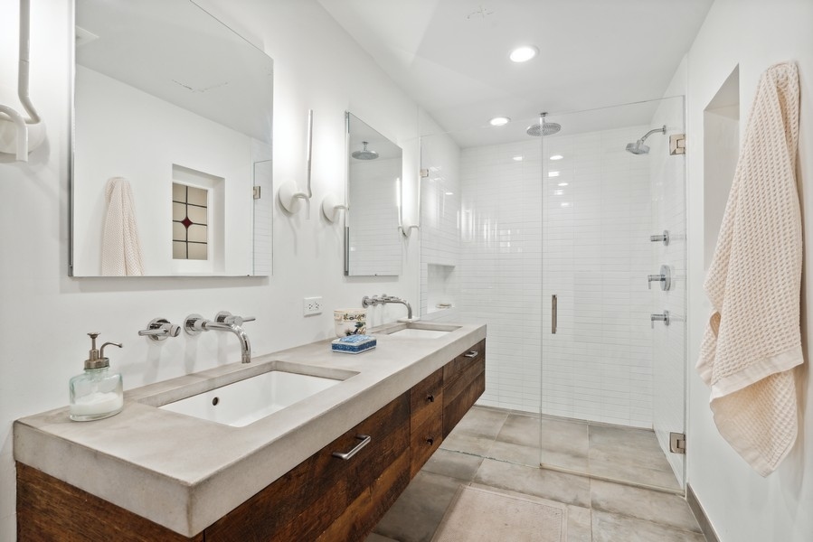 1116 East 48th Street Chicago, IL 60615 - Photo 13 of 25 a spacious bathroom with a double vanity sink mirror and