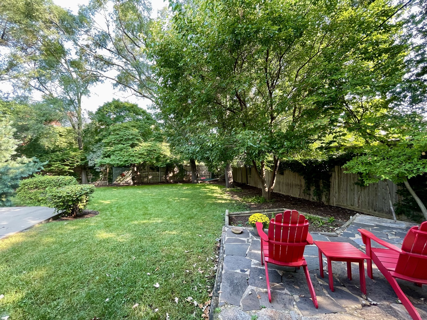 1116 East 48th Street Chicago, IL 60615 - Photo 23 of 25 a view of a sitting area with furniture and garden