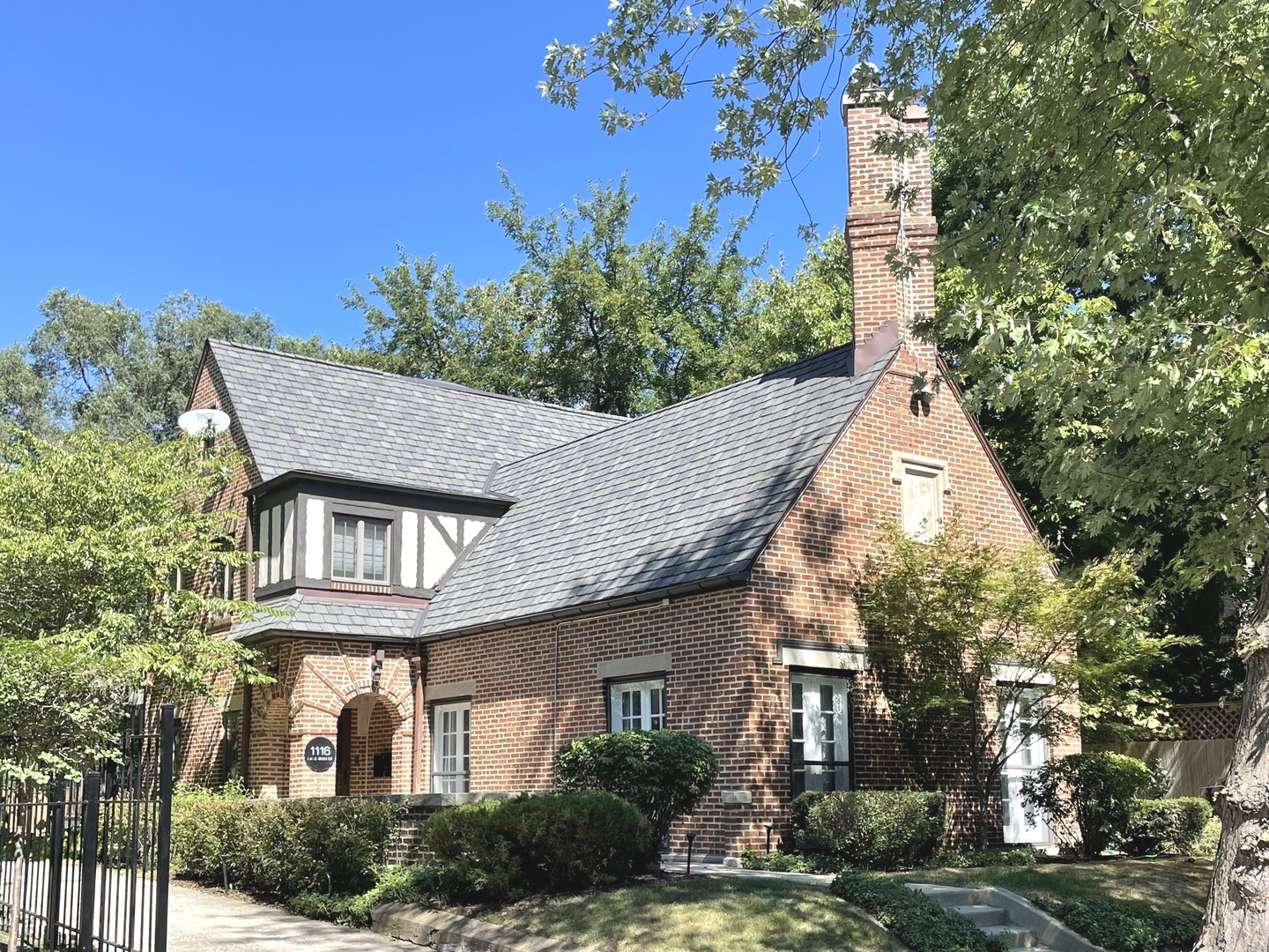 1116 East 48th Street Chicago, IL 60615 - Photo 25 of 25 a view of a white house next to a yard