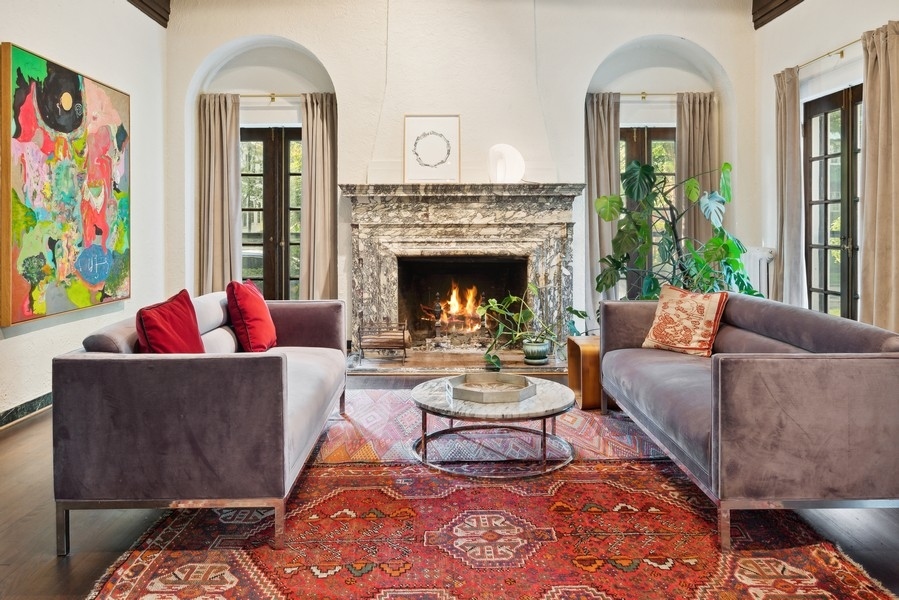 1116 East 48th Street Chicago, IL 60615 - Photo 5 of 25 a living room with furniture and a fireplace
