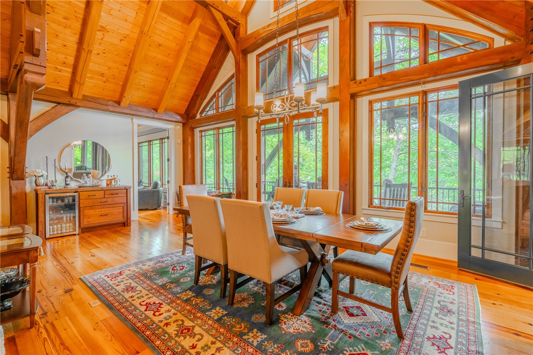 102 State Rd S-39-143 Sunset, SC 29685 - Photo 13 of 47 This dining room offers high ceilings and a view of the natural surroundings.