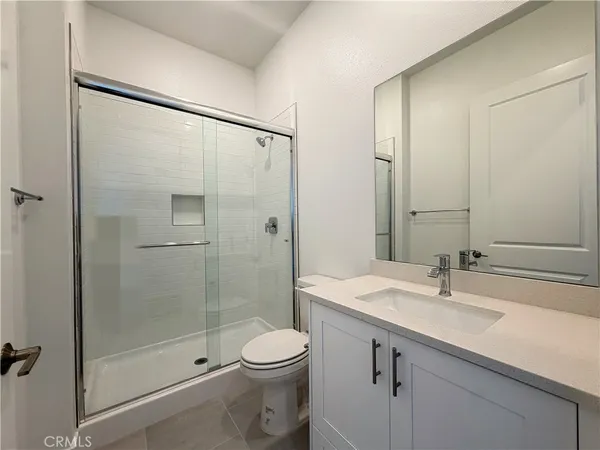 a utility room with sink dryer and washer