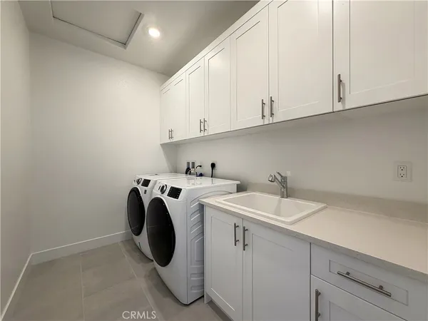 an empty room with a empty space and windows