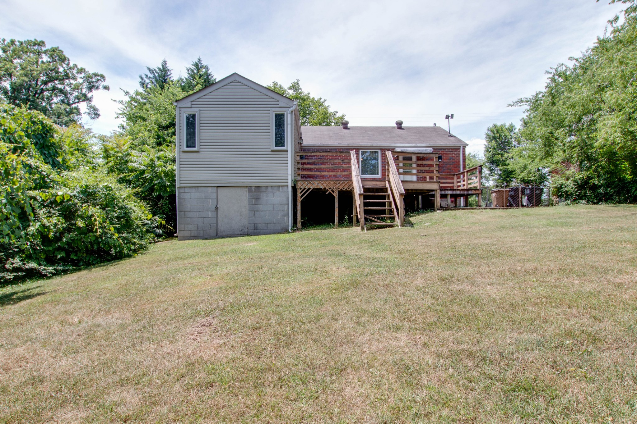 5002 Yorktown Road Nashville, TN 37211 - Photo 21 of 24 a front view of a house with a yard and garage