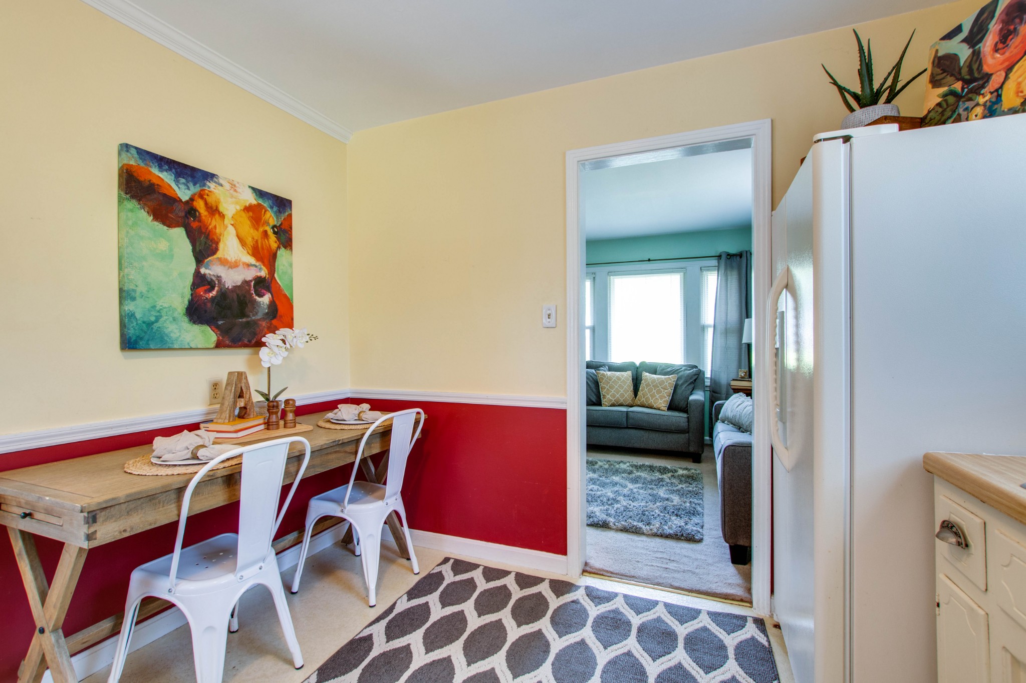 5002 Yorktown Road Nashville, TN 37211 - Photo 10 of 24 a bedroom with furniture and a painting on the wall