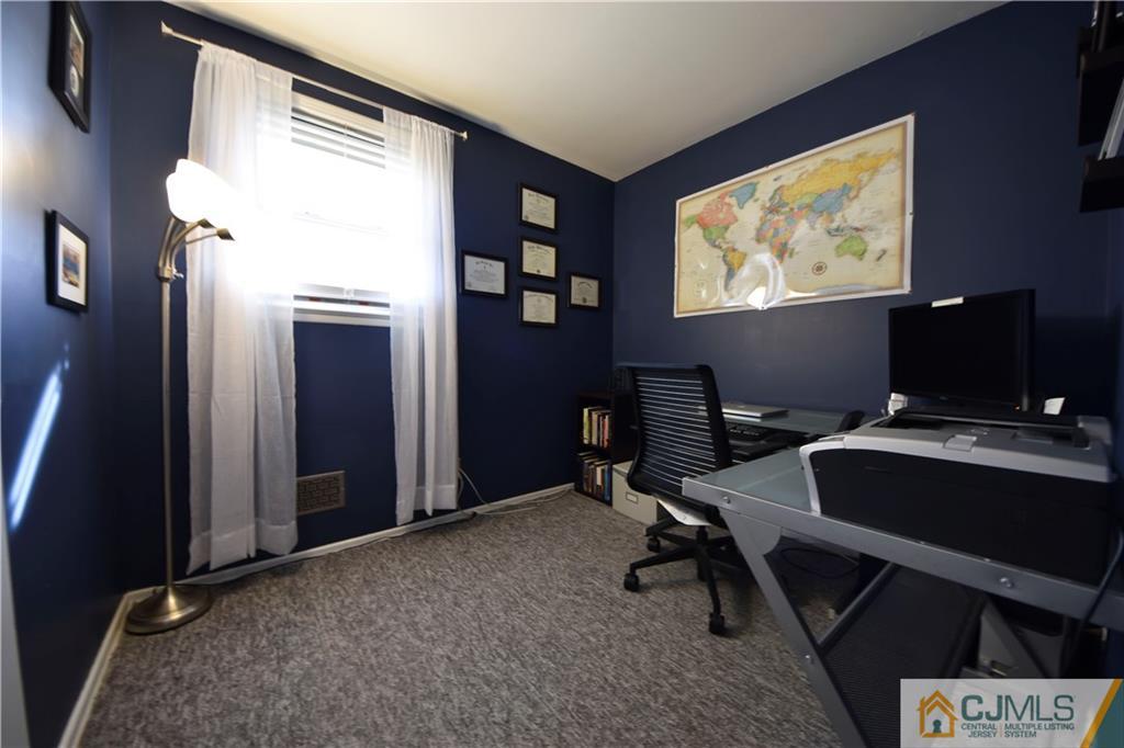 15 Thomas Road East Brunswick, NJ 08816 - Photo 14 of 20 a workspace with furniture and window