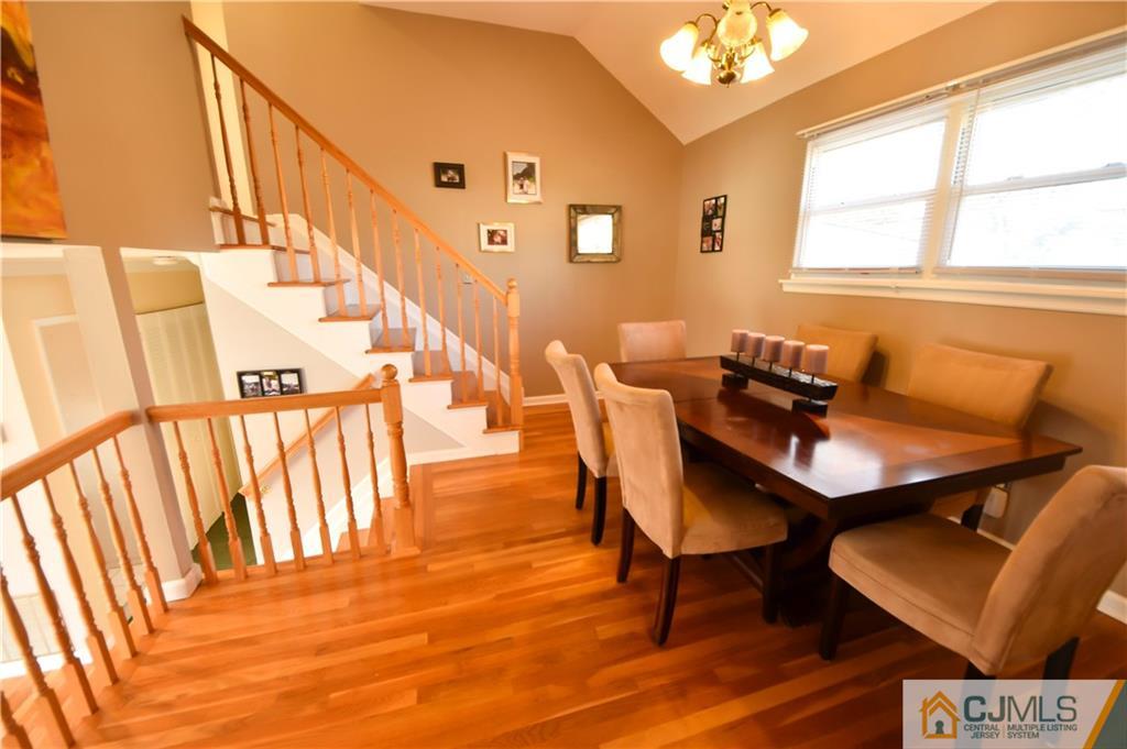 15 Thomas Road East Brunswick, NJ 08816 - Photo 9 of 20 a dining room with furniture and wooden floor