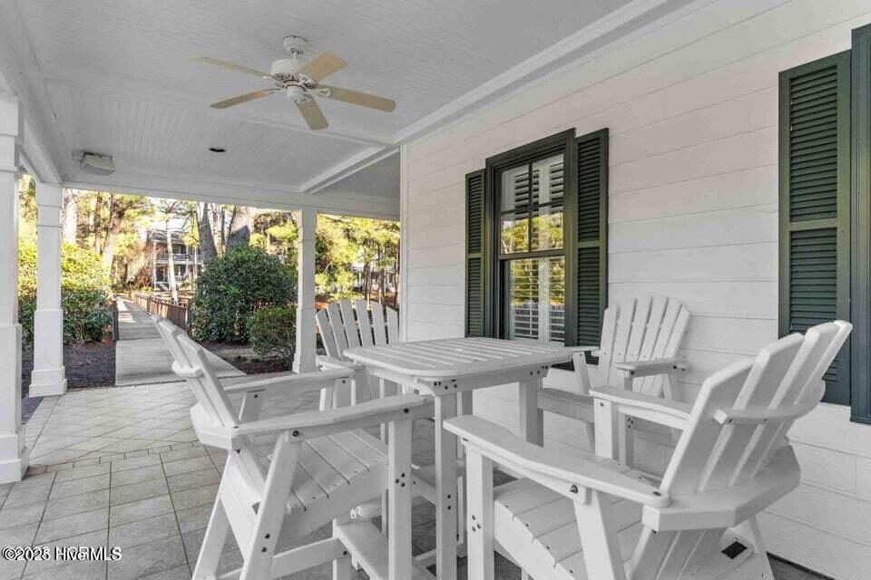 9204 Hutton Heights Way Southwest Calabash, NC 28467 - Photo 55 of 66 patio tables at clubhouse