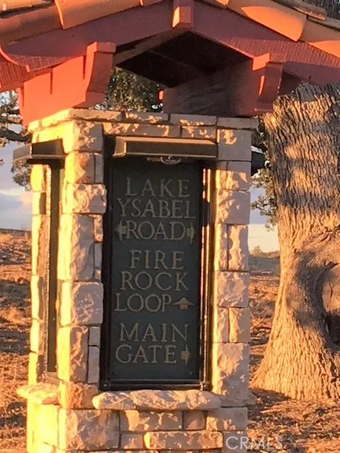1880 Fire Rock Loop Templeton, CA 93465 - Photo 4 of 7 a view of a wooden door and a street sign