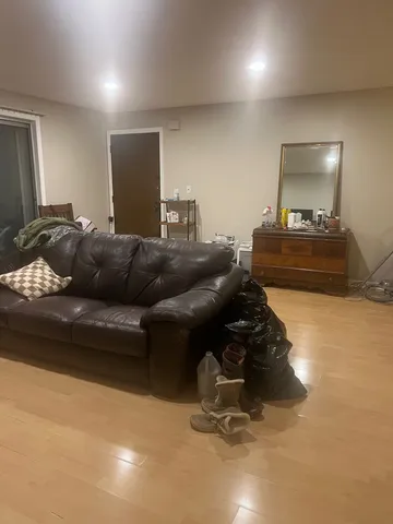 a kitchen with a refrigerator a stove a washer and dryer