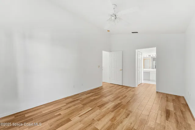 a bathroom with a sink vanity and a mirror