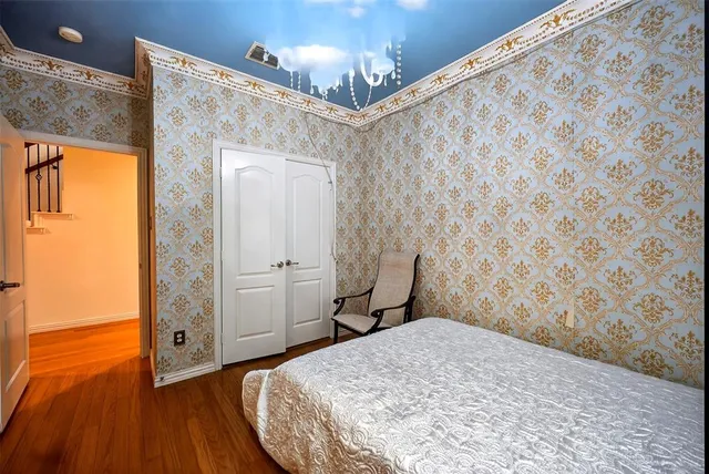 a bathroom with a sink toilet vanity and shower