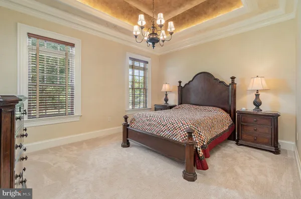 a kitchen with stainless steel appliances granite countertop a sink stove cabinets and granite counter tops