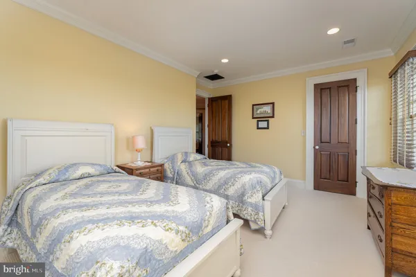 a view of a room with wooden walls