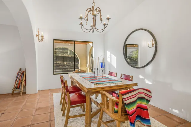 a kitchen with a sink cabinets and window