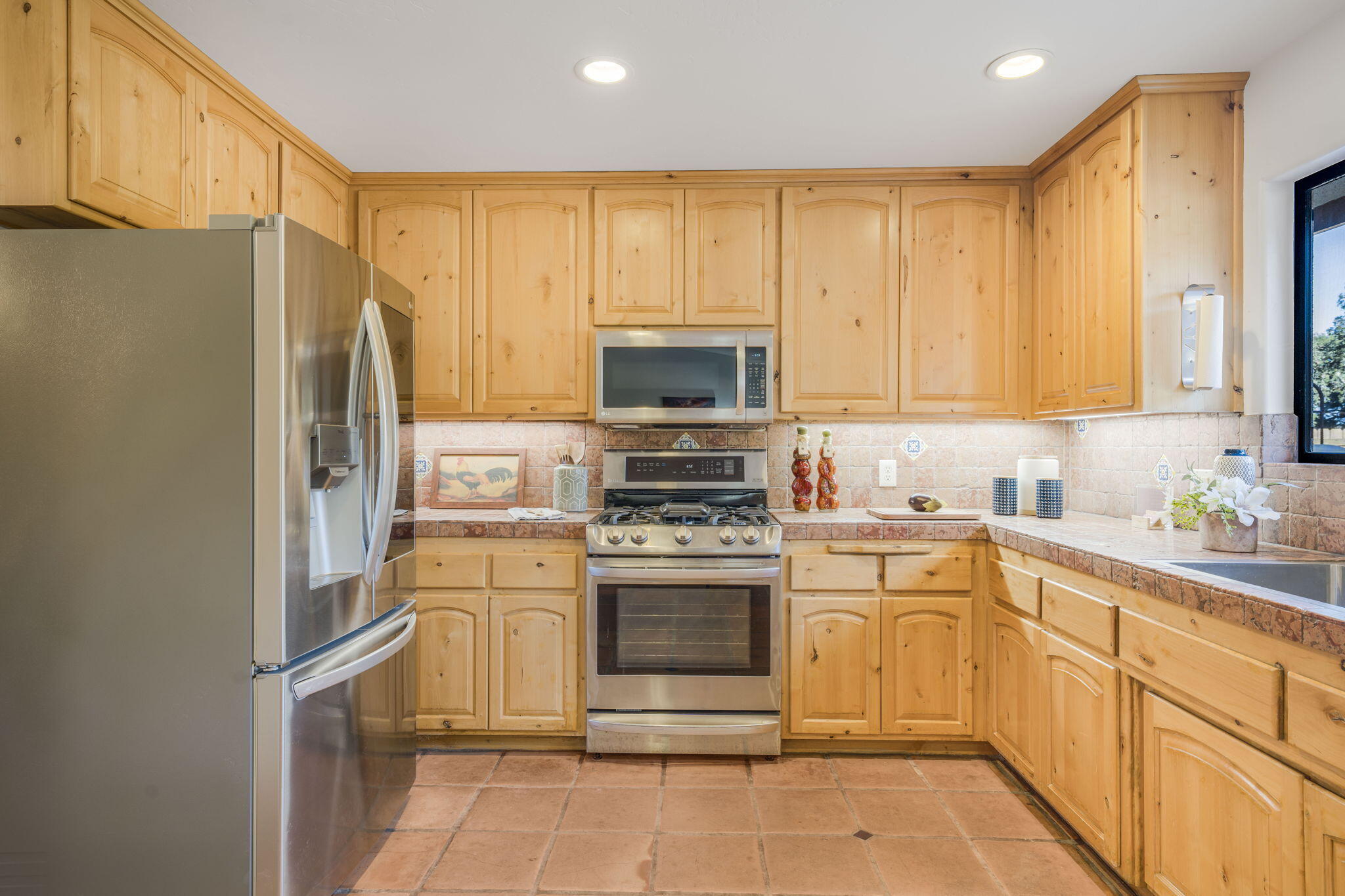 80 Bobcat Springs Road Buellton, CA 93427 - Photo 15 of 72 a kitchen with cabinets stainless steel appliances and a window