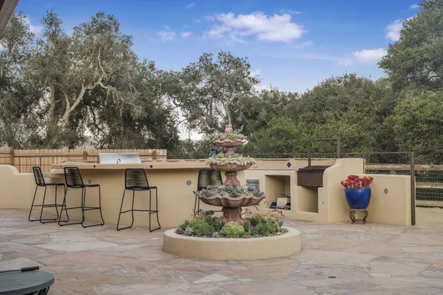 a spacious bathroom with a double vanity sink and a bathtub