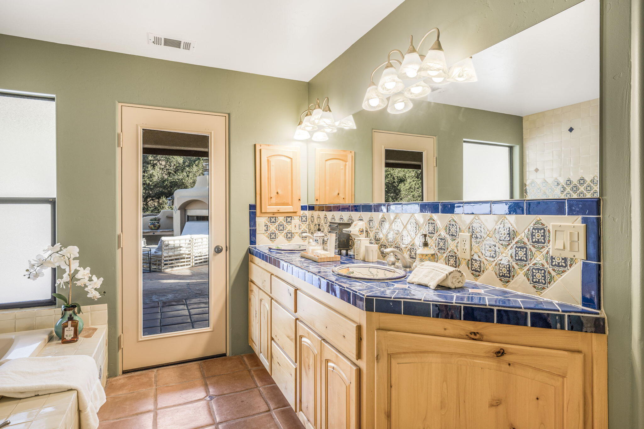 80 Bobcat Springs Road Buellton, CA 93427 - Photo 32 of 72 a bathroom with a sink and a mirror