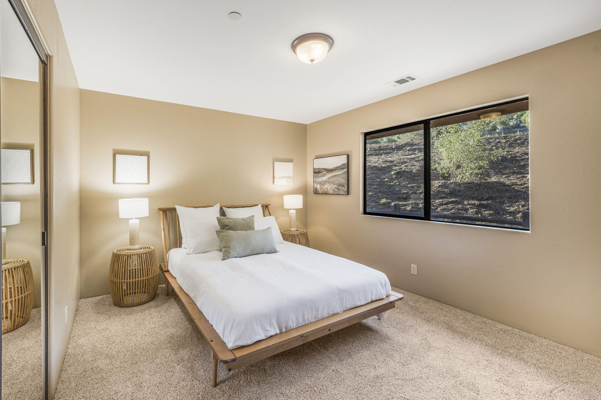 80 Bobcat Springs Road Buellton, CA 93427 - Photo 40 of 72 a bedroom with a large bed and a window