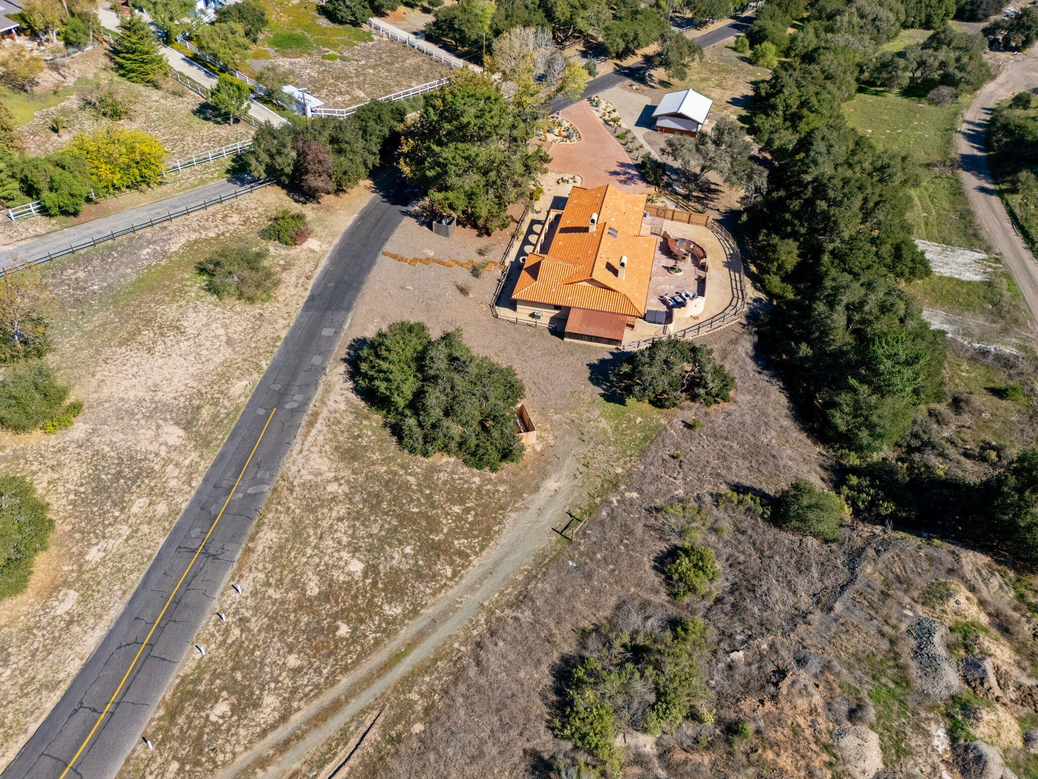 80 Bobcat Springs Road Buellton, CA 93427 - Photo 68 of 72 an aerial view of a house with a yard and mountain