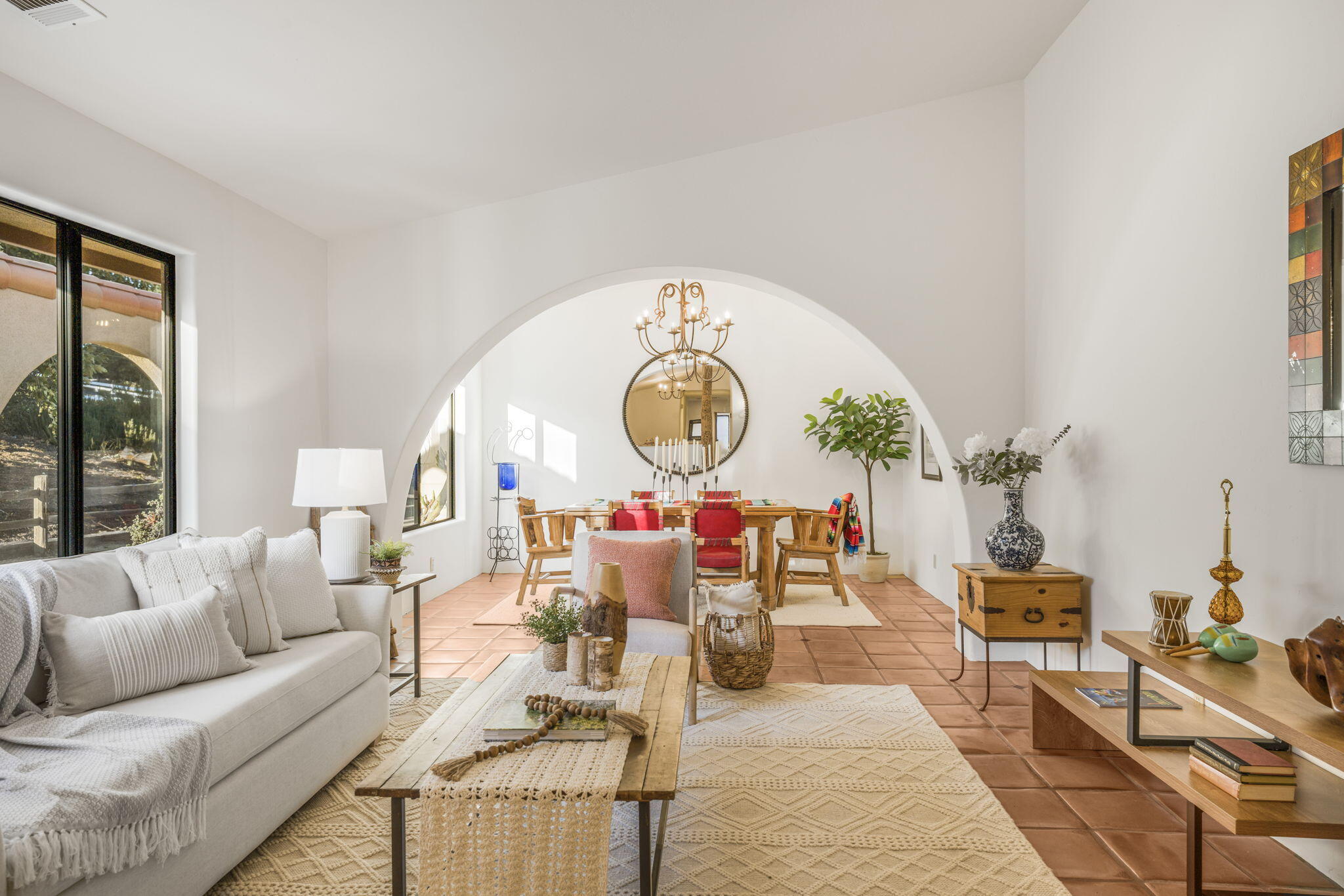 80 Bobcat Springs Road Buellton, CA 93427 - Photo 9 of 72 a living room with furniture a large window and a potted plant