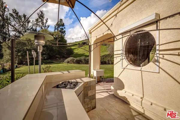 a view of a couches in patio of a house