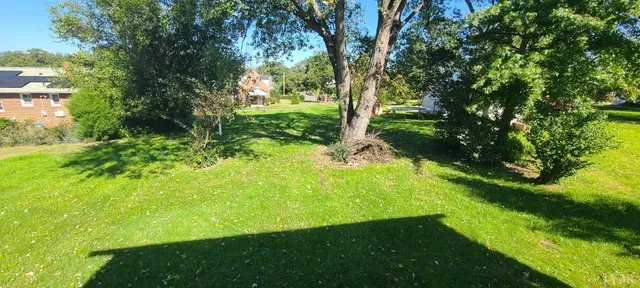 a view of an outdoor space and a yard