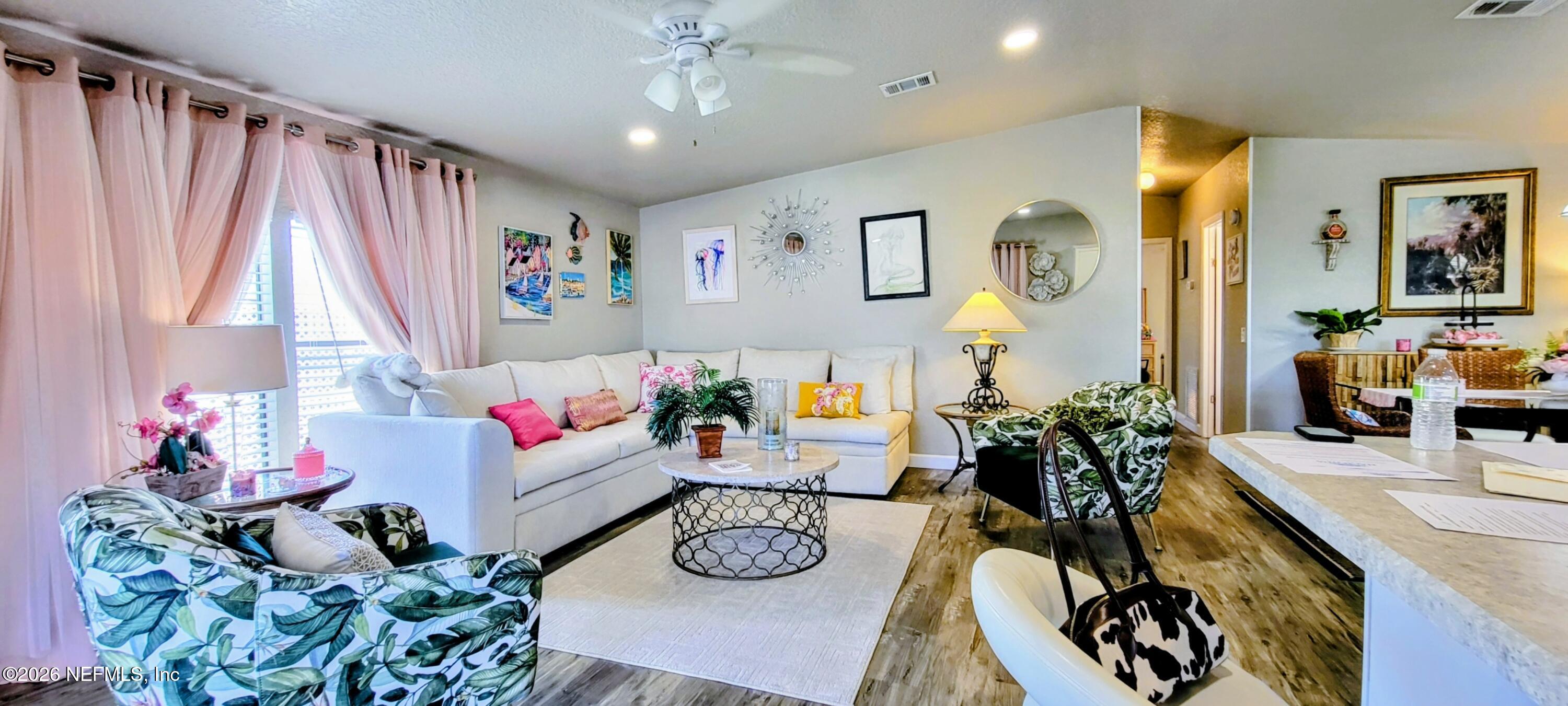 148 Rio Grande Edgewater, FL 32141 - Photo 14 of 74 a living room with furniture and a table