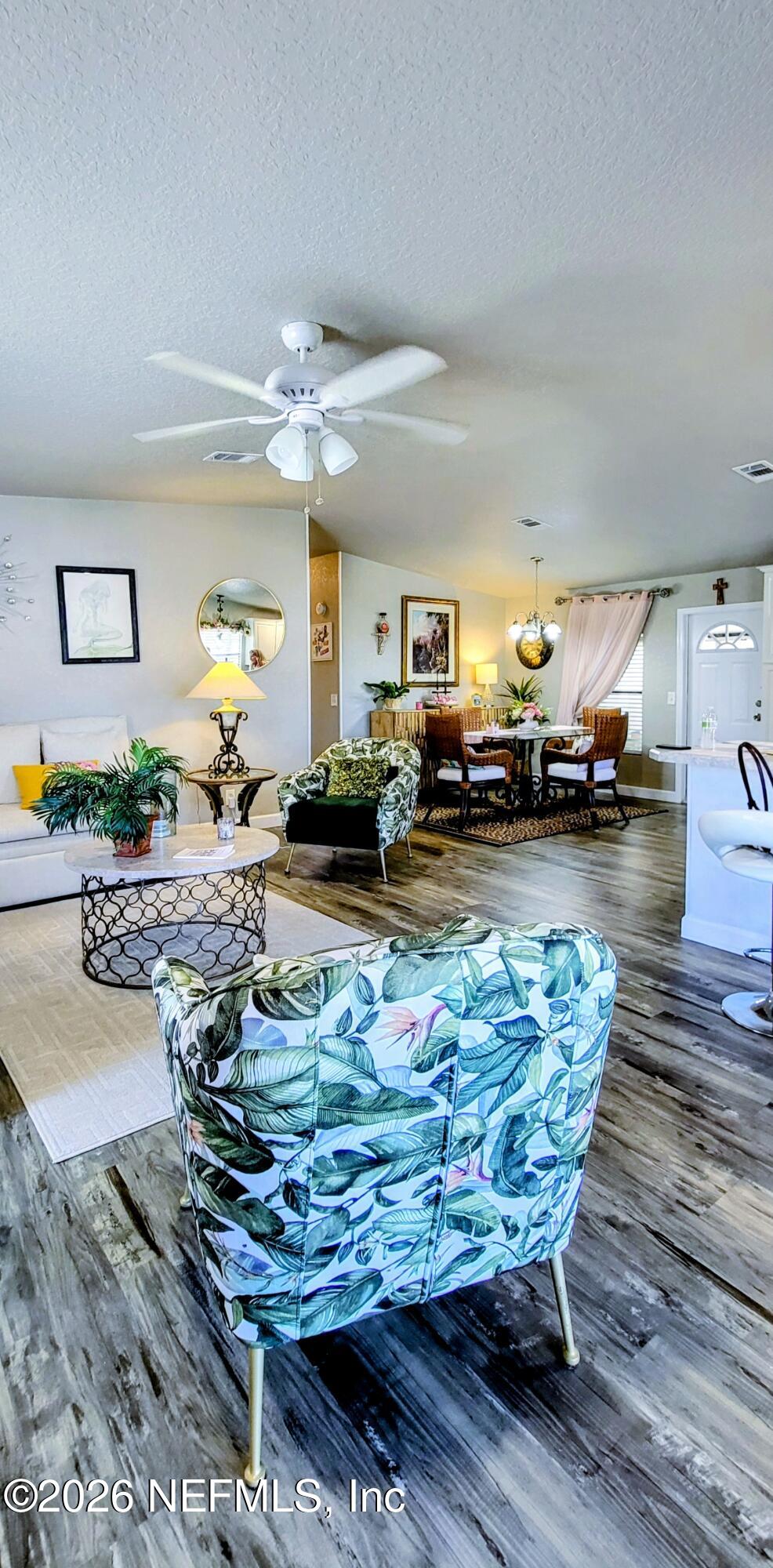 148 Rio Grande Edgewater, FL 32141 - Photo 33 of 74 a view of a living room and dining room