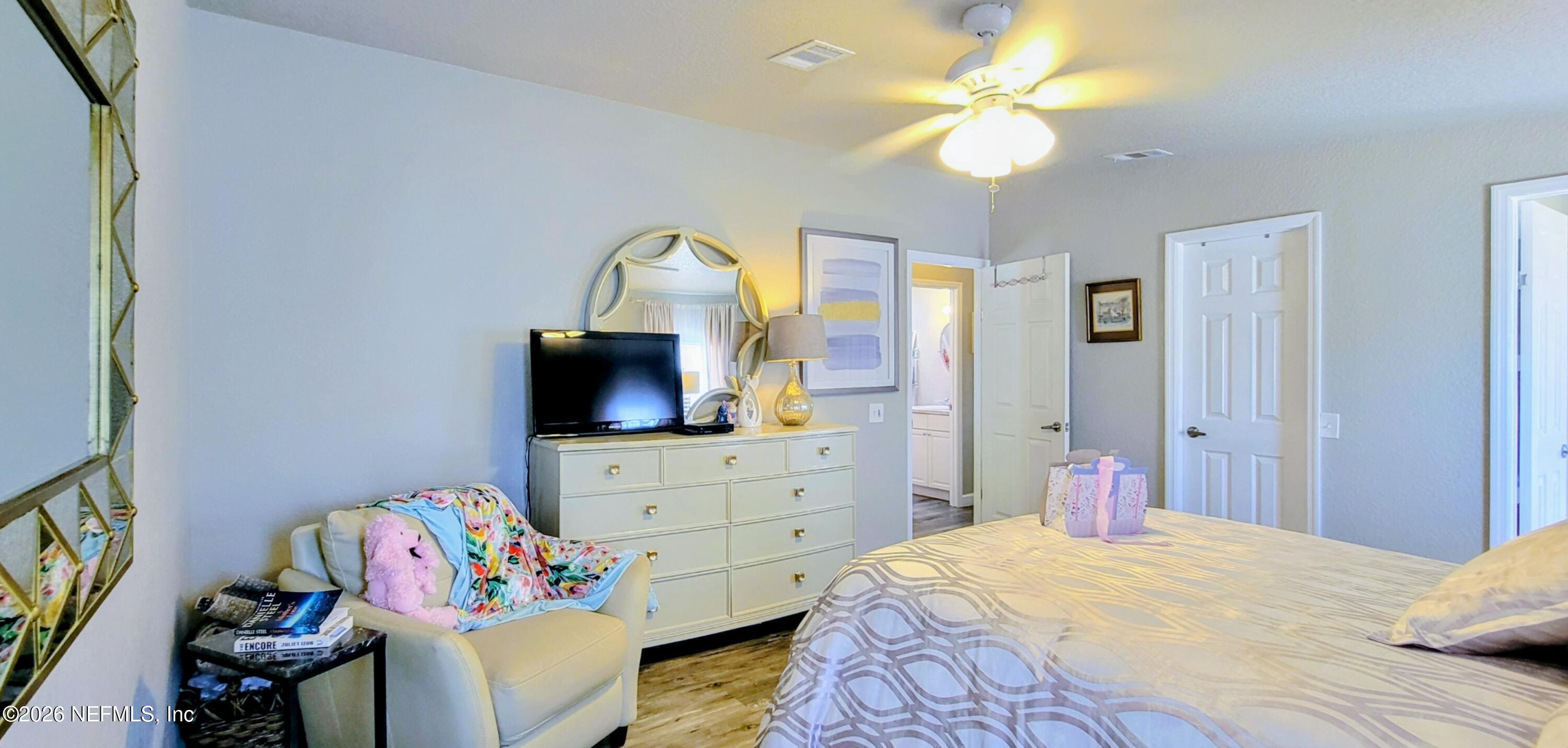 148 Rio Grande Edgewater, FL 32141 - Photo 40 of 74 a bedroom with a bed and furniture