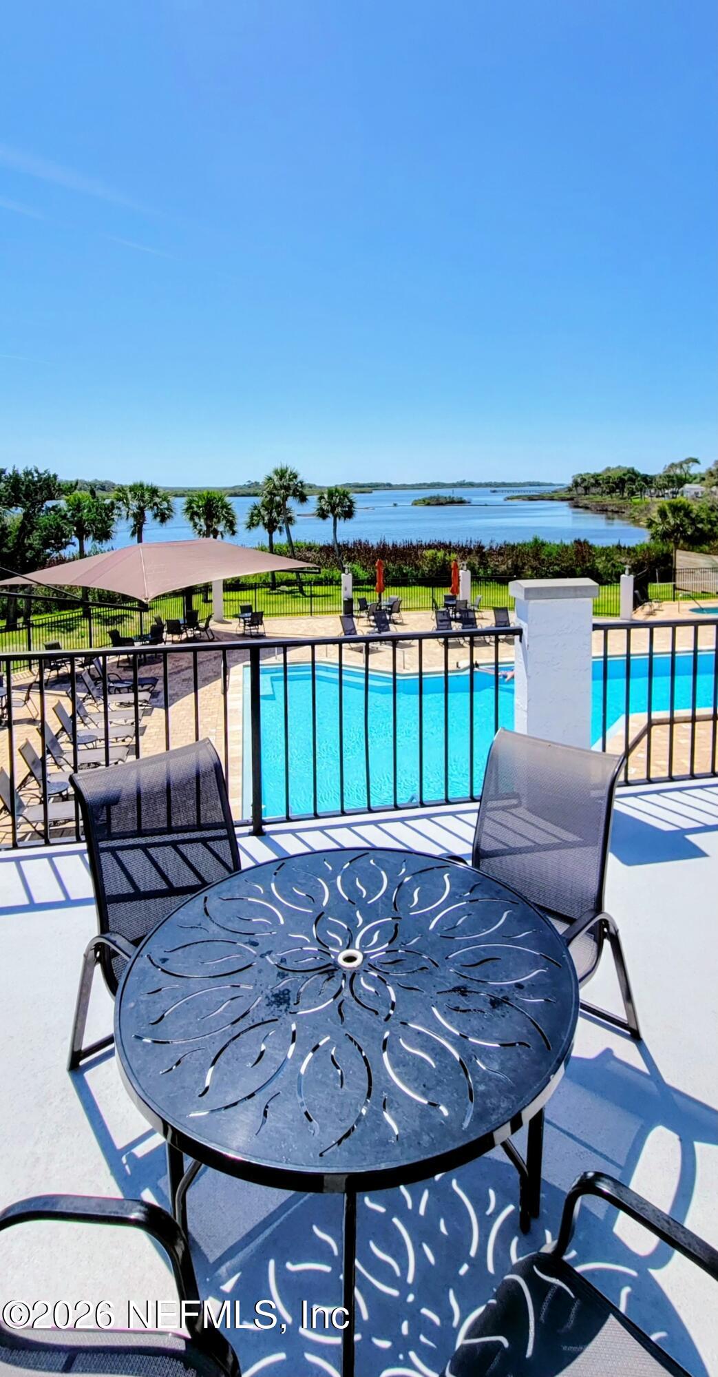 148 Rio Grande Edgewater, FL 32141 - Photo 63 of 74 a view of a chairs and table in the patio