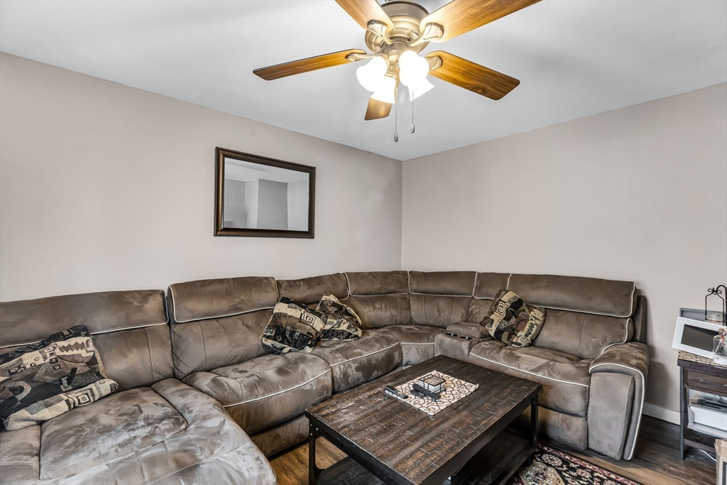 302 Middlefield Road Chester, MA 01011 - Photo 16 of 42 a living room with furniture and a ceiling fan