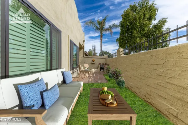 a view of a pathway with a big yard