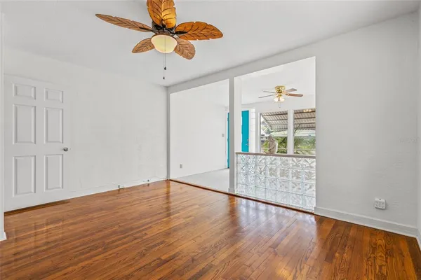a kitchen with a stove top oven and refrigerator