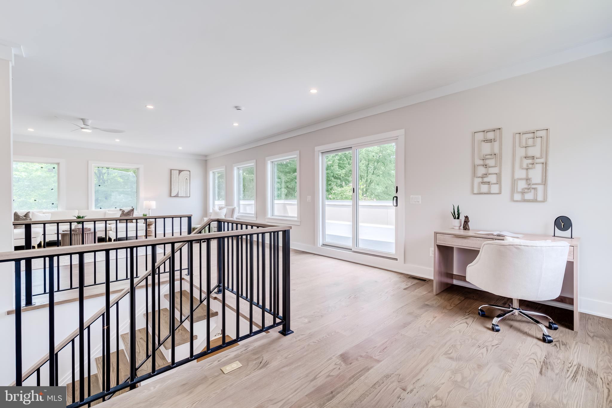 506 Kingsley Road Southwest Vienna, VA 22180 - Photo 106 of 150 a view of a workspace with furniture and a window