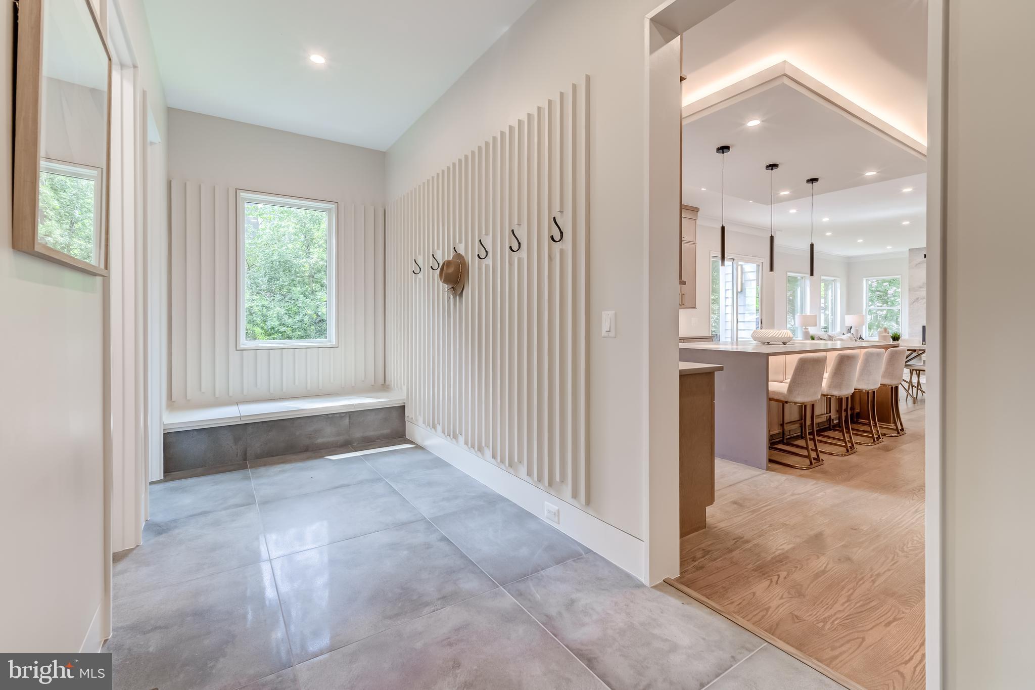 506 Kingsley Road Southwest Vienna, VA 22180 - Photo 58 of 150 a view of a hallway with a livingroom and a dinning area
