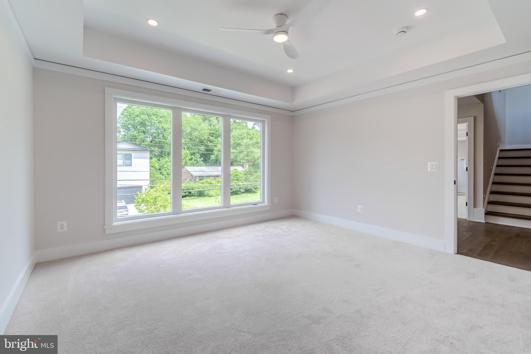 506 Kingsley Road Southwest Vienna, VA 22180 - Photo 98 of 150 an empty room with windows and outdoor view