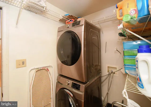 a bathroom with a bathtub and a sink