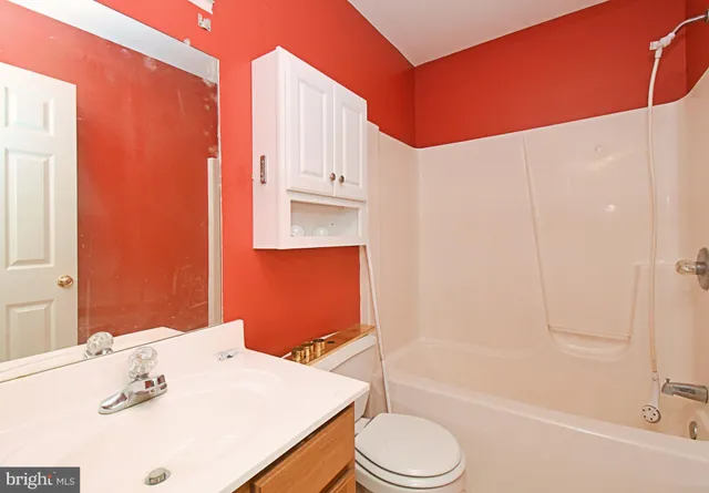 a view of a chairs and table in the patio