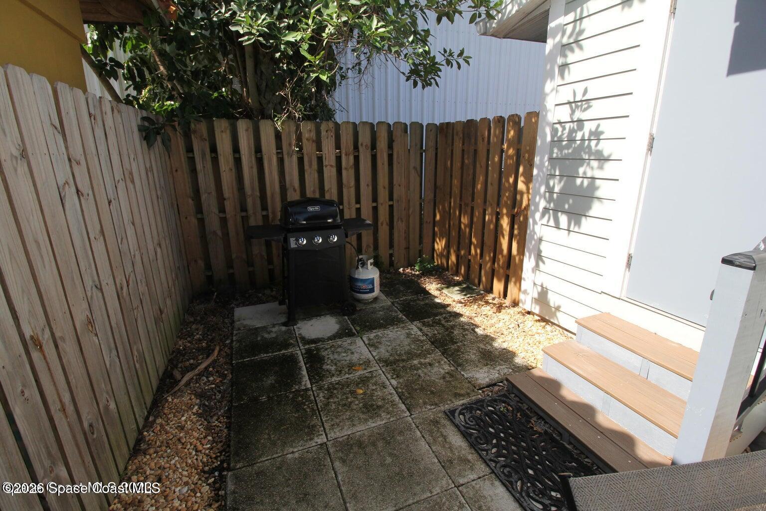 1935 Oak Street Melbourne, FL 32901 - Photo 12 of 13 a porch with wooden floor