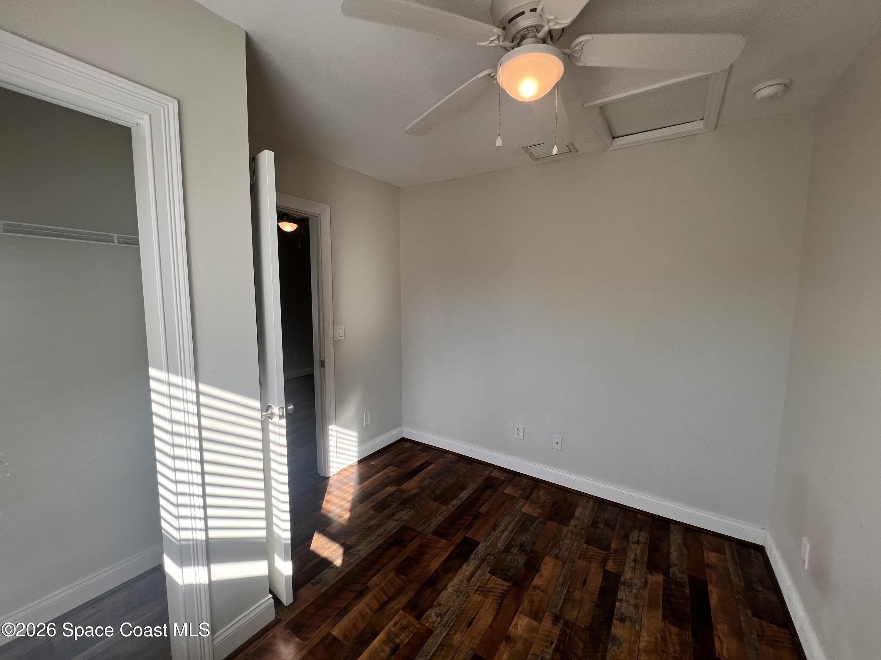 1935 Oak Street Melbourne, FL 32901 - Photo 3 of 13 a view of a livingroom with a window and wooden floor